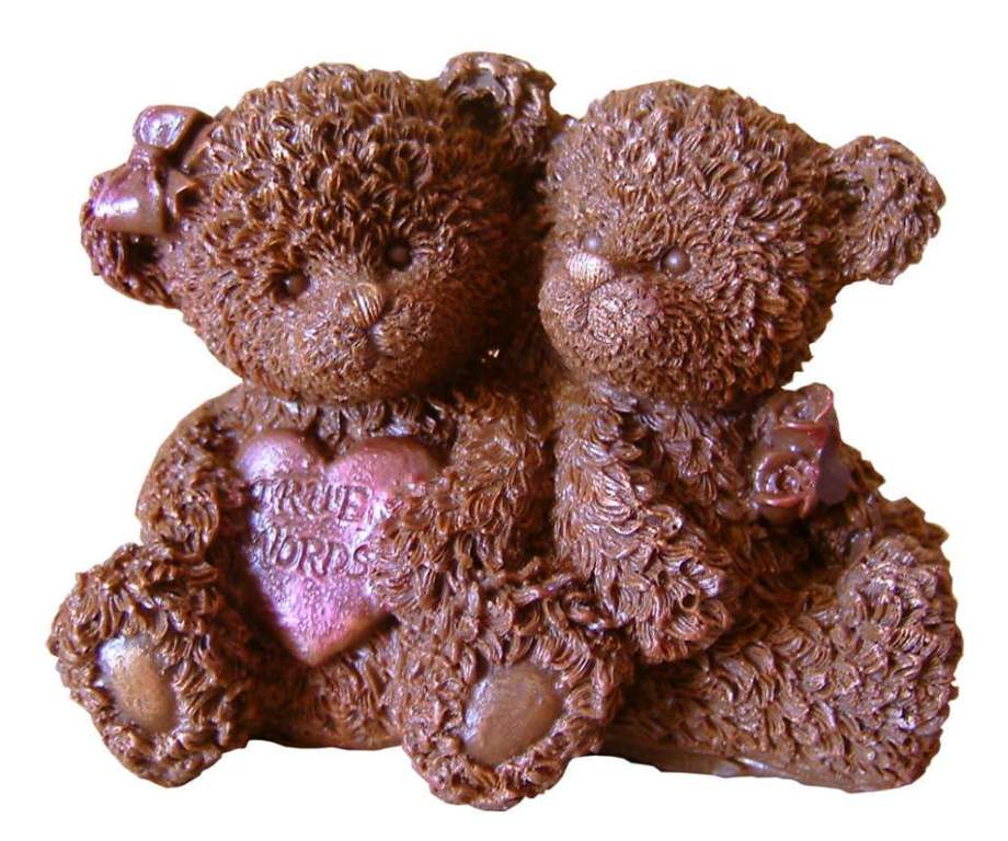 Мишка-лакомка: шоколадная фигурка медведя - нежный соблазн, который покоряет сердца своей притягательностью и сладким ароматом.